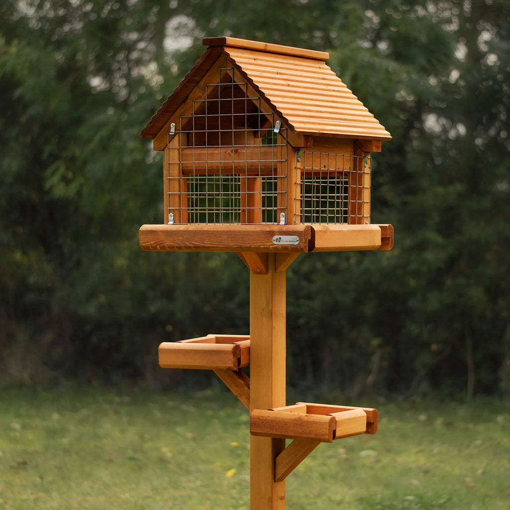 crow proof bird table with entrance for small species and places for larger species